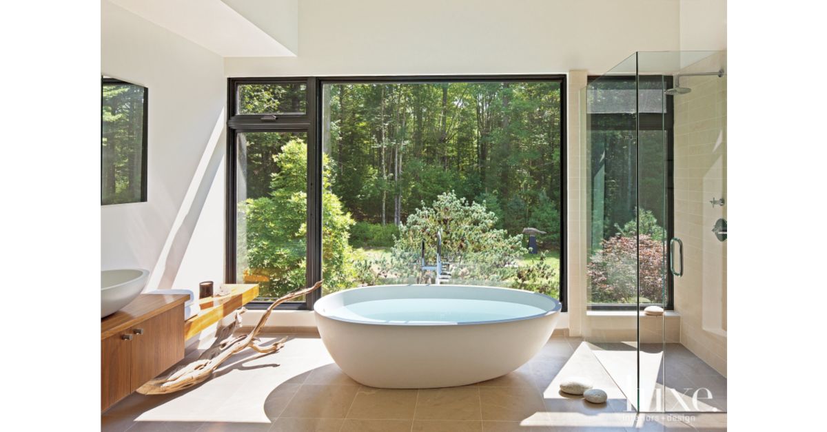 Contemporary Master Bathroom with Forest Views Luxe Interiors + Design