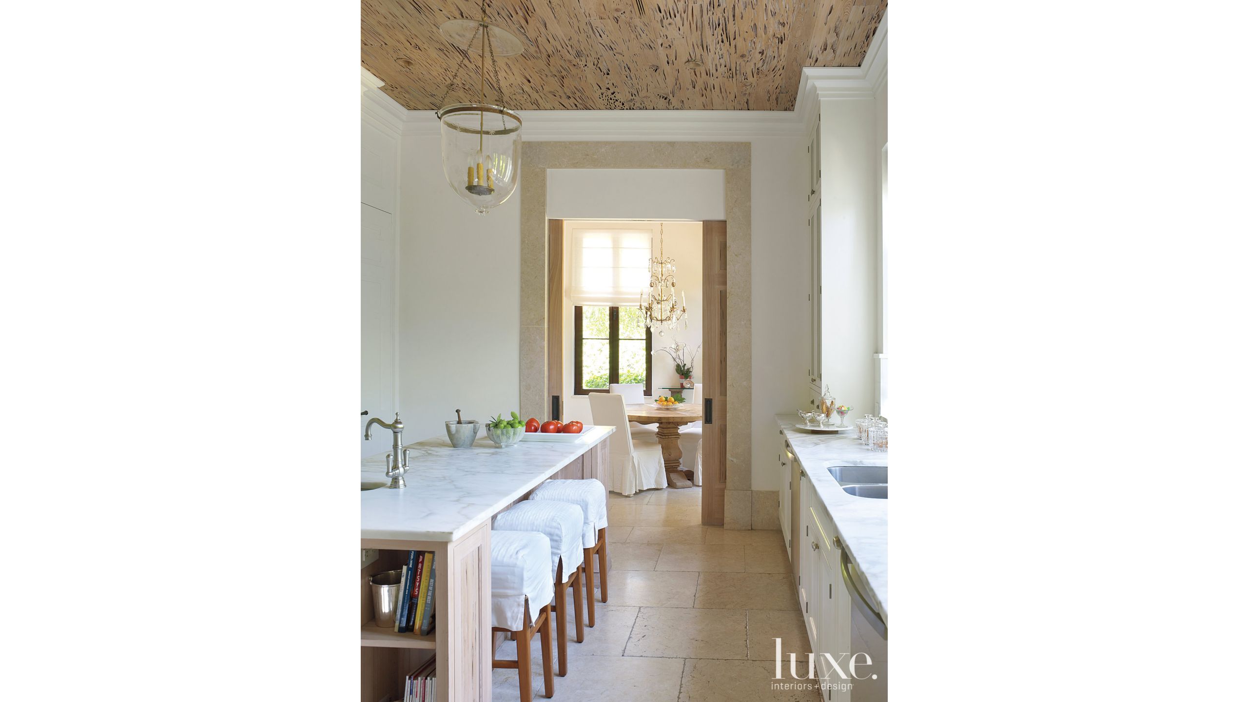 Contemporary White Kitchen With Pecky Cypress Ceiling Luxe