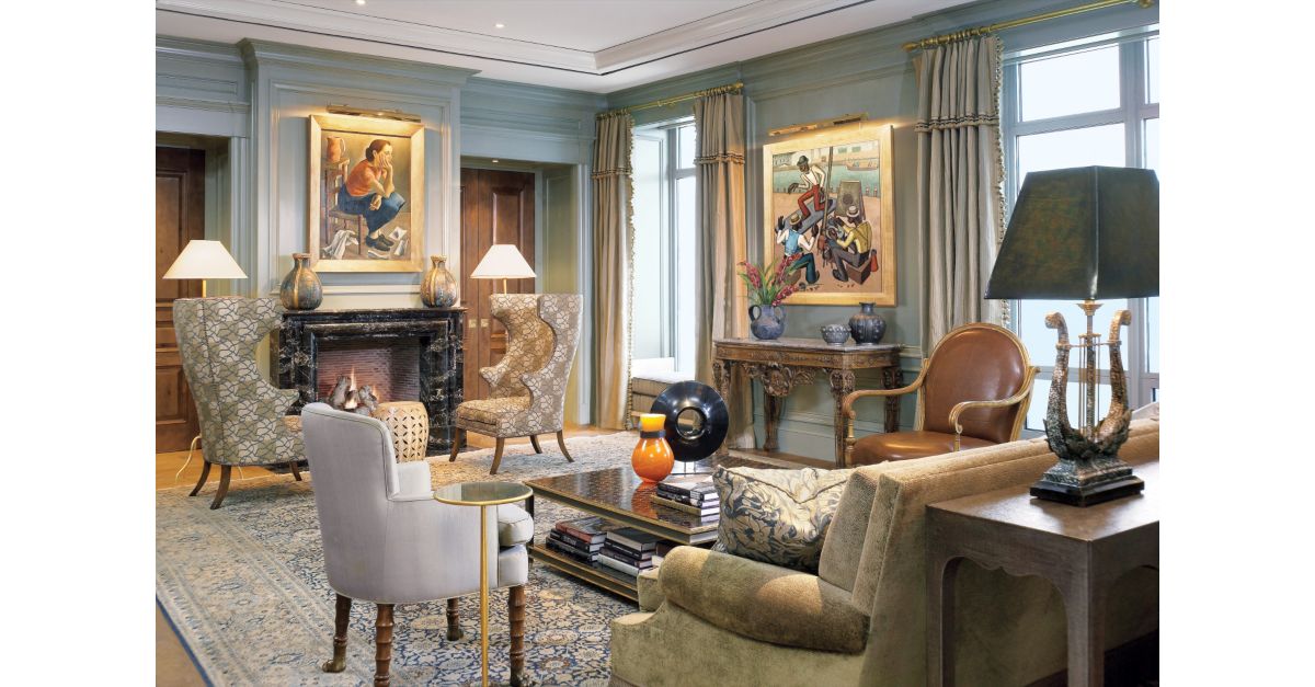 Traditional Blue Living Room with French Artwork - Luxe Interiors + Design