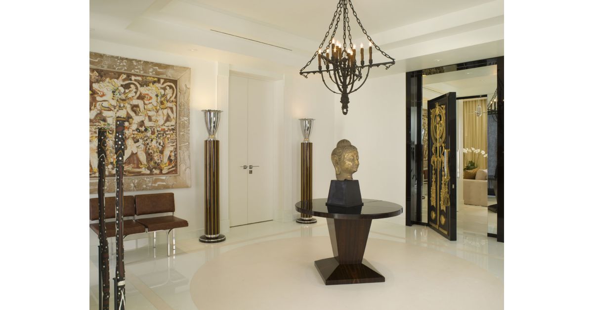 Modern Neutral Foyer with Buddha Head Statue Luxe Interiors + Design