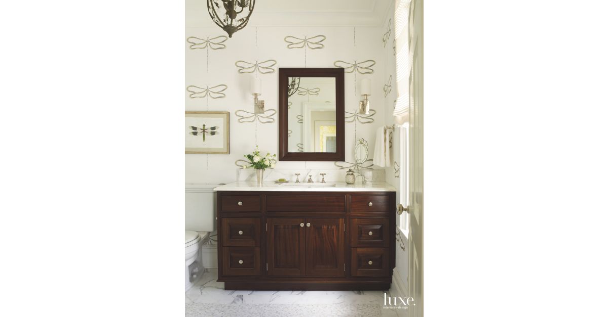 Dragonfly Wallpaper Bathroom with Dark Cabinetry - Luxe Interiors + Design