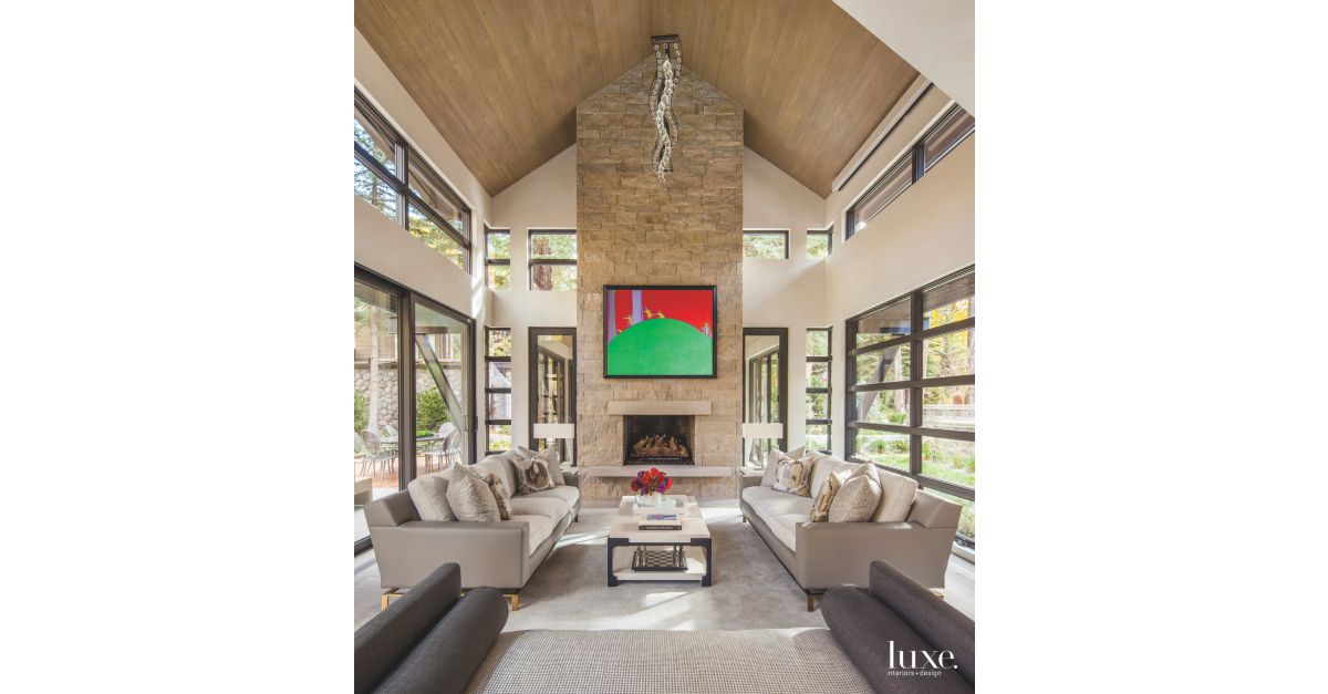 High Vaulted Ceiling Living Room with Stone Fireplace and Dangling ...