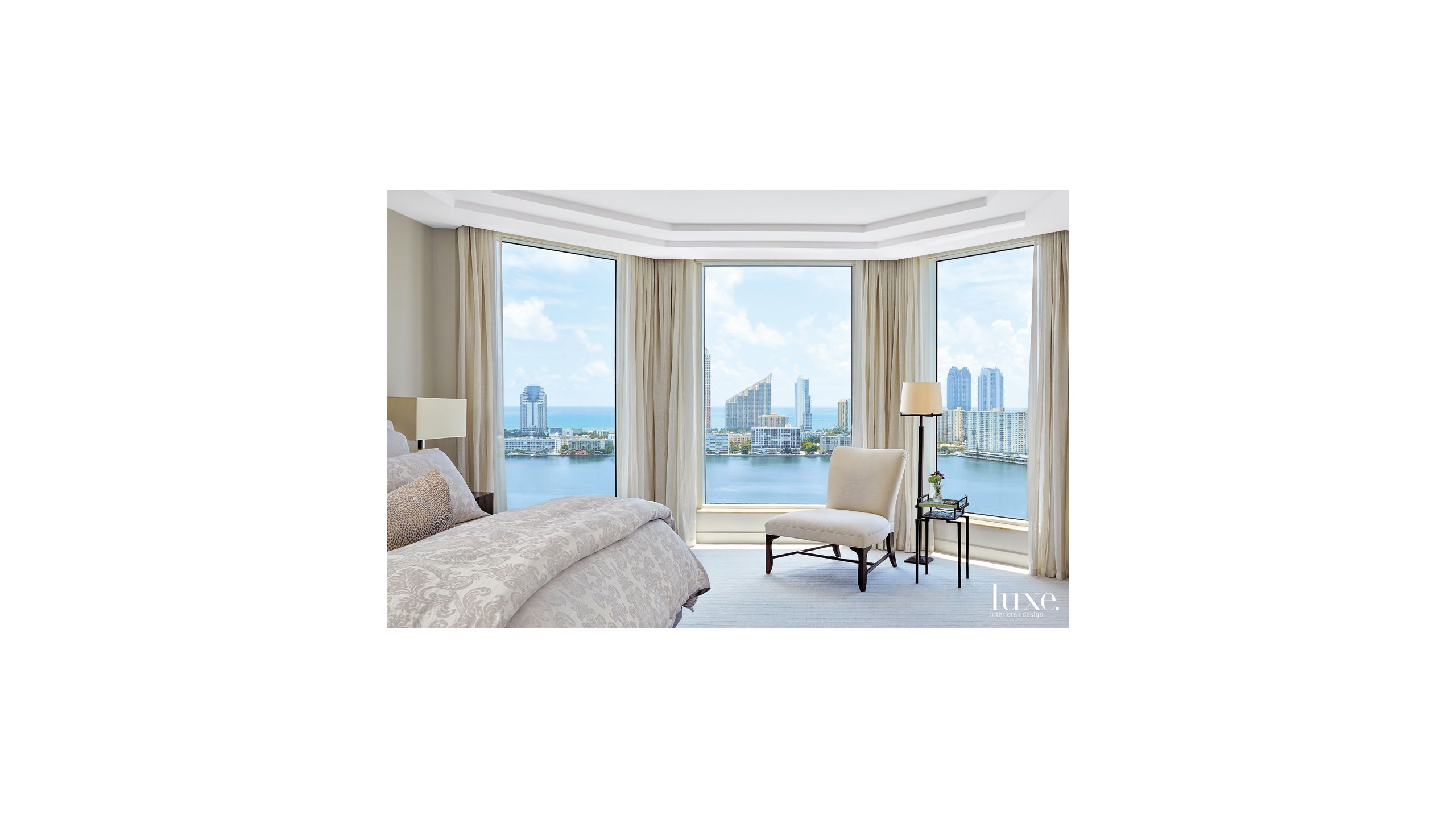 Contemporary Cream Bedroom With Floor To Ceiling Bay Windows