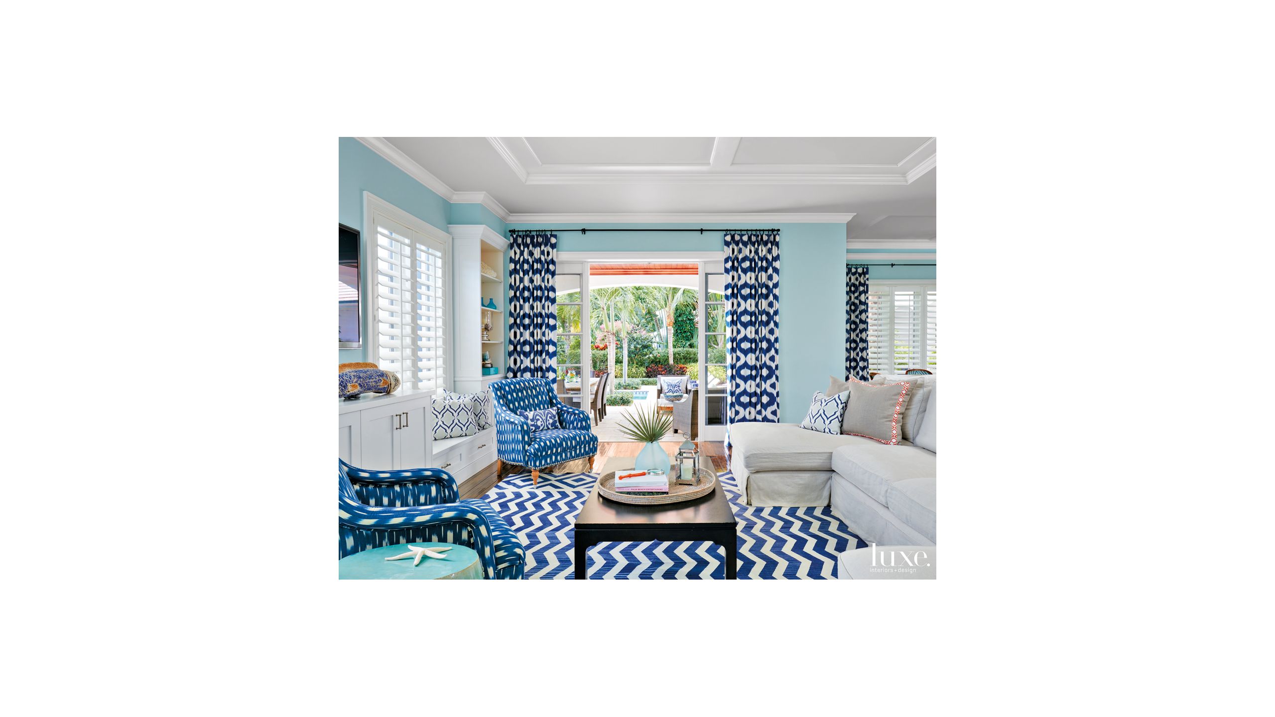 Mediterranean Blue Family Room With Bold Blue And White