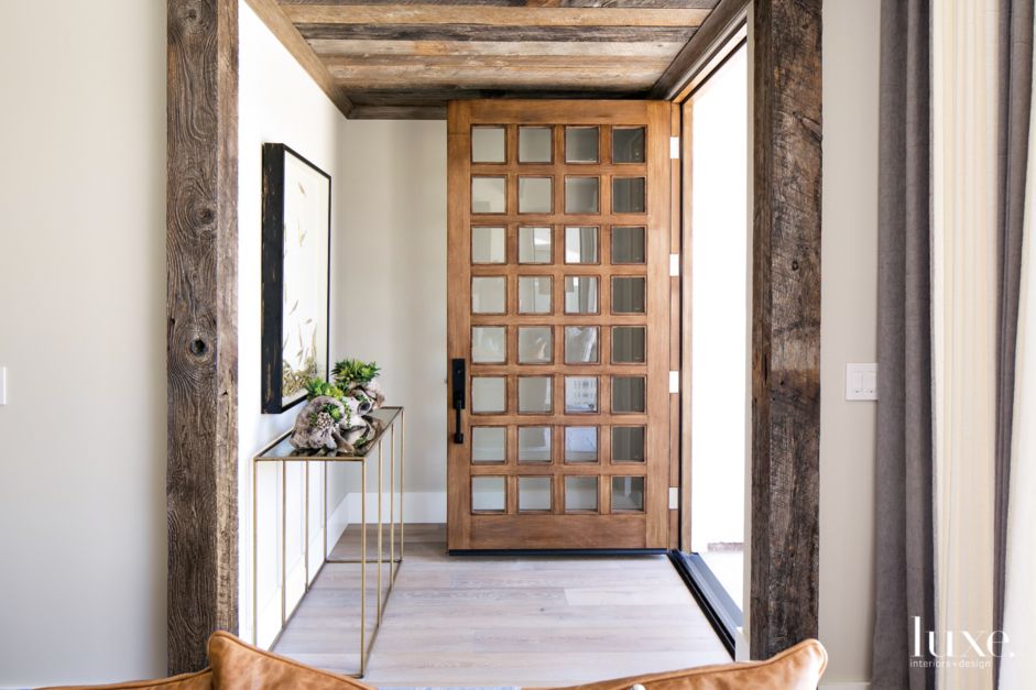 Contemporary Neutral Entry with Rustic Wood Lattice Door