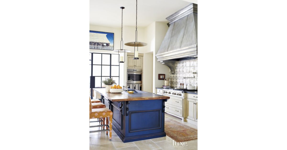 Mediterranean Cream Kitchen  with Blue  Island  Luxe 