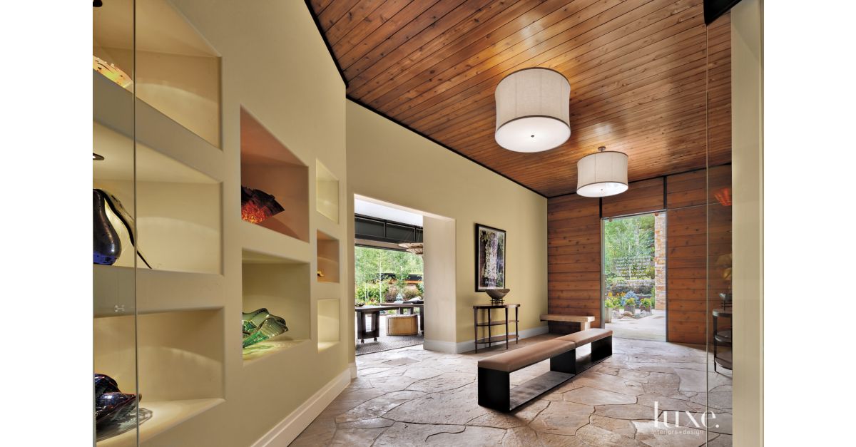 Transitional Cream Entry with Flagstone Floor Luxe Interiors + Design