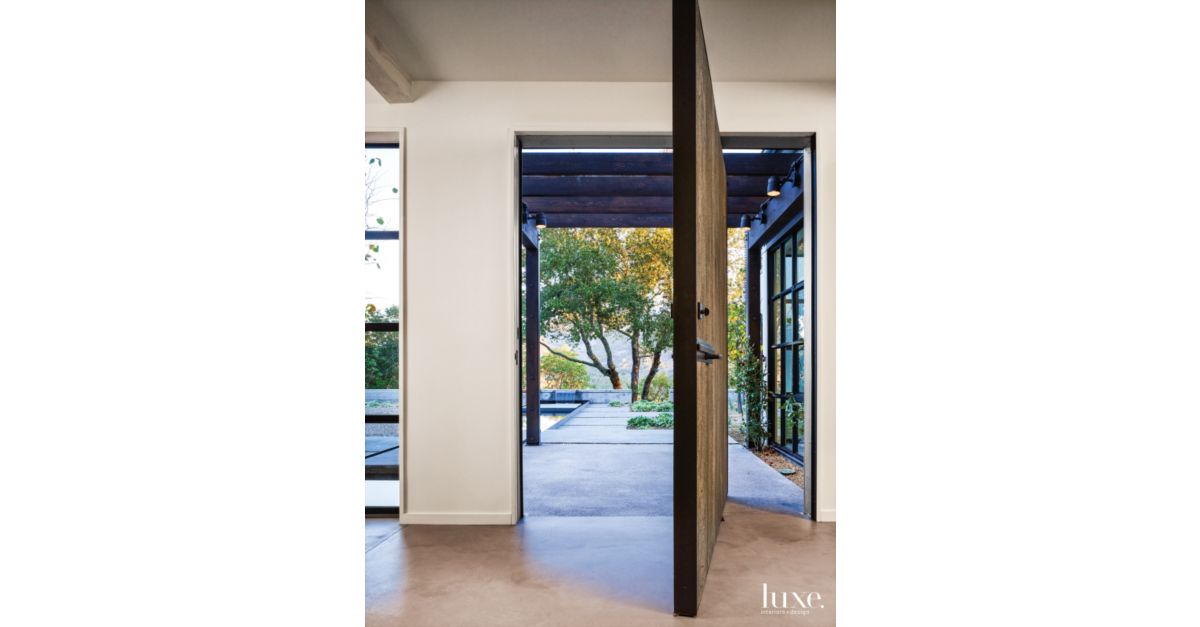 Modern White Front Entry with Custom Wood-and-Steel Door 