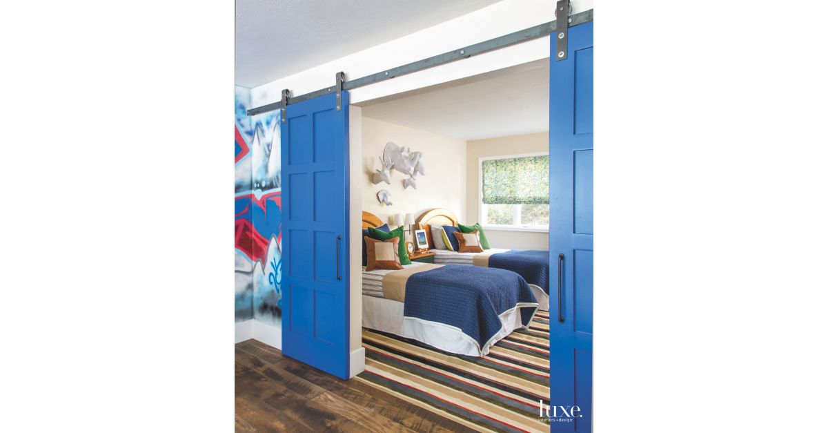 Children's Sleeping Quarters with Blue Sliding Doors Luxe Interiors