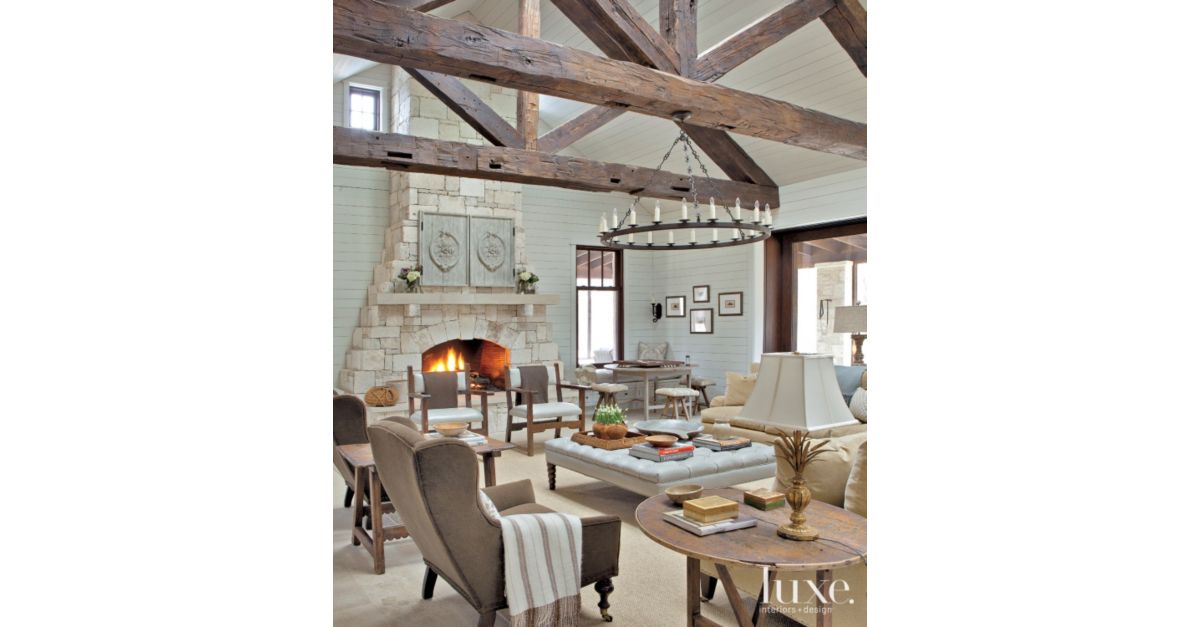 Neutral Transitional Living Room with Stone Fireplace - Luxe Interiors